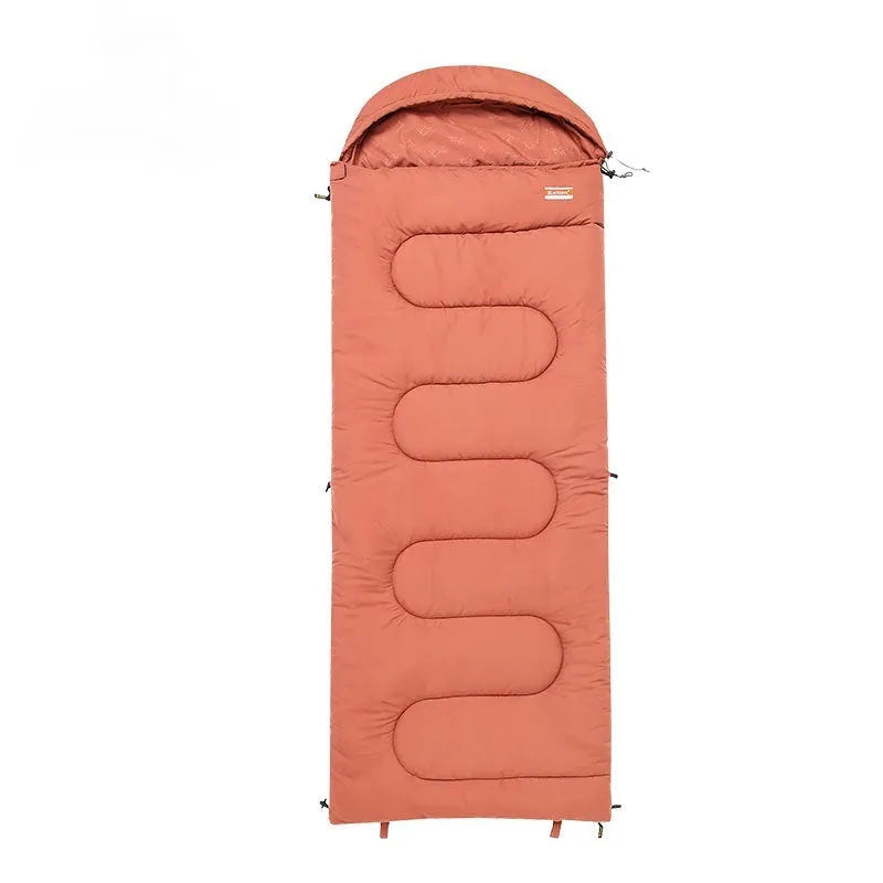 Ochre cotton camping sleeping bag quilt folded to show ultra-light portable design