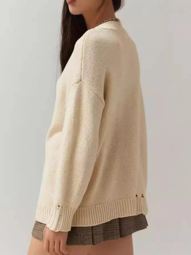 Women's milky white acrylic jacquard sweater with round neck and long sleeves