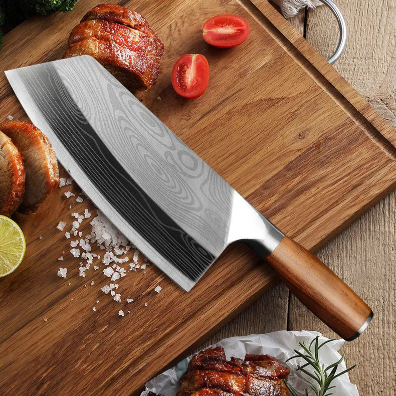 A 320mm stainless steel kitchen knife with a forged blade on a cutting board.