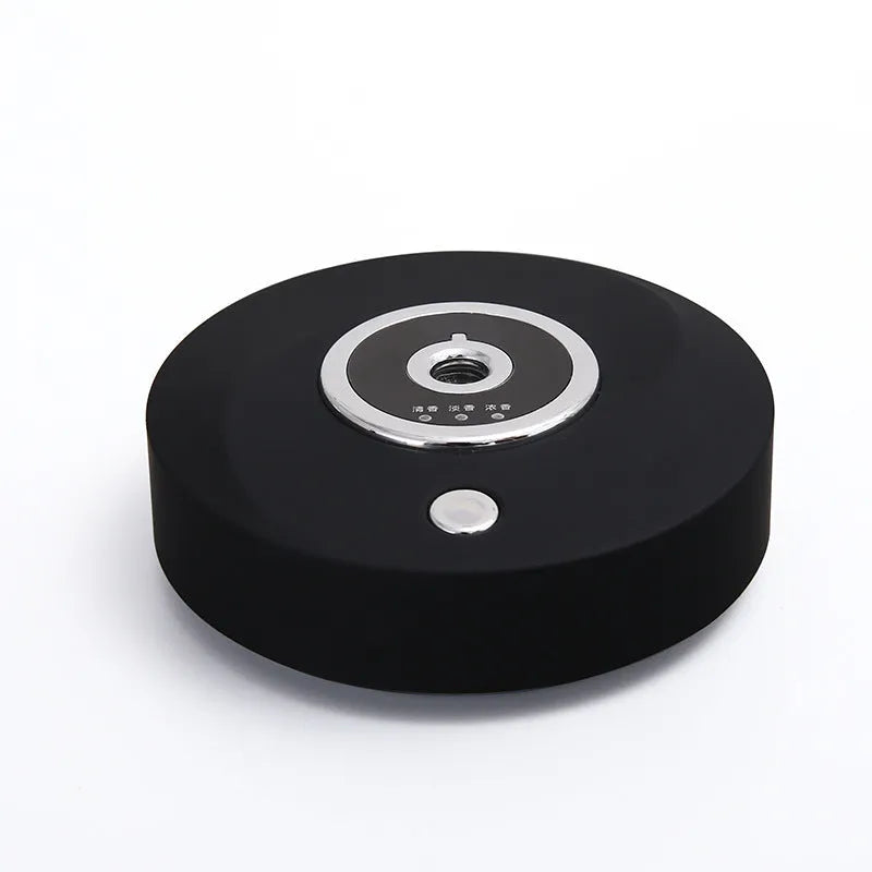 USB-powered car air freshener diffuser in black plastic with anti-slip pad for dashboard mounting