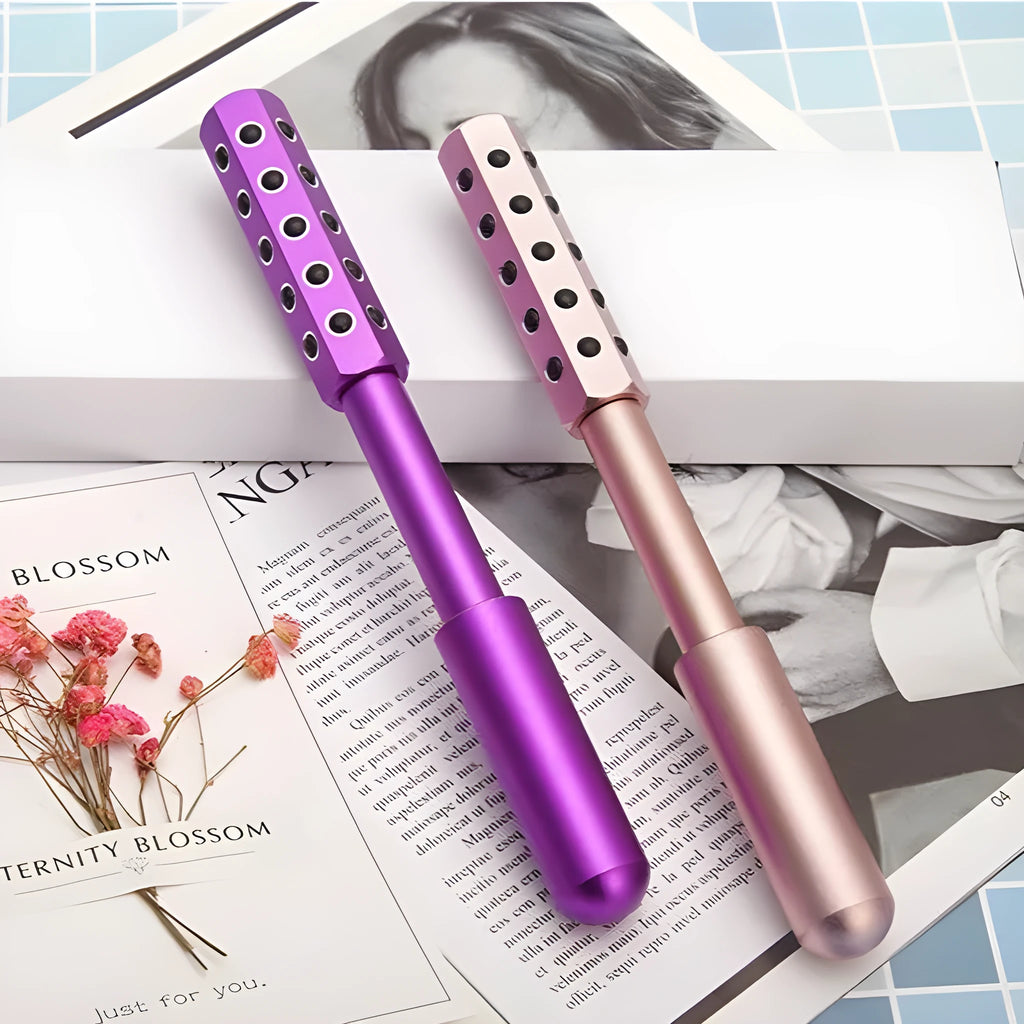 Purple handheld beauty massage roller with germanium particles for facial treatment