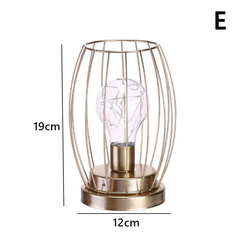 Geometric iron light bulb candle ornament with electroplated metallic finish, hanging as Nordic style home decor