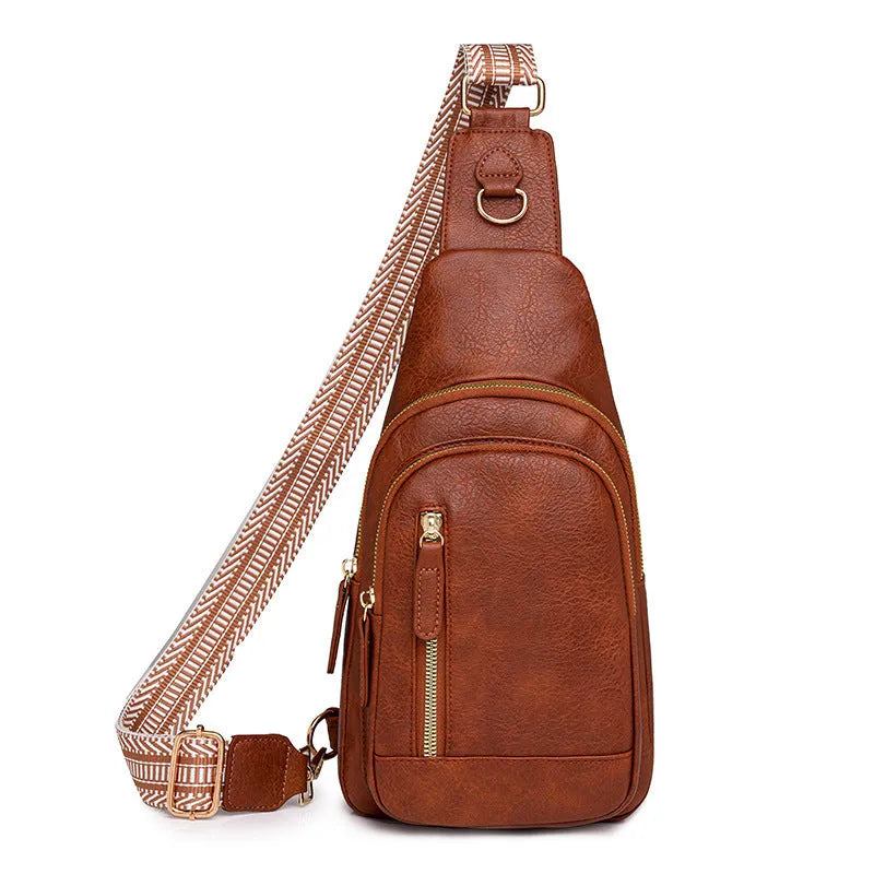 Women's small brown PU leather chest bag with open front pocket worn across chest