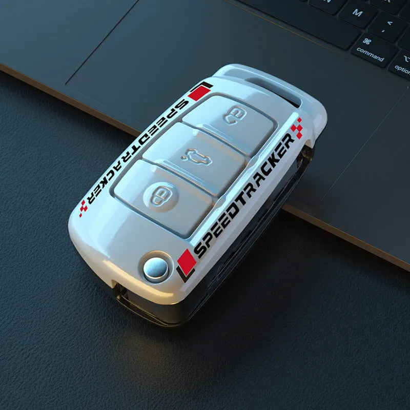 Carbon fibre style car key cover with mirror element in carbon black colour