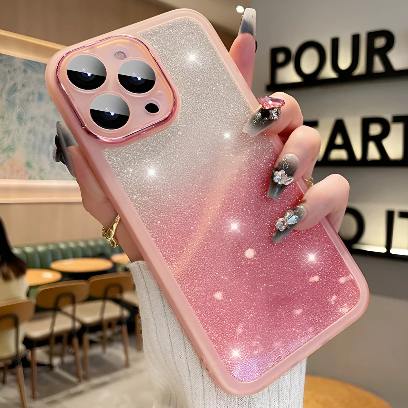 Ultra-thin transparent glitter gradient iPhone case with magnetic suction on a table