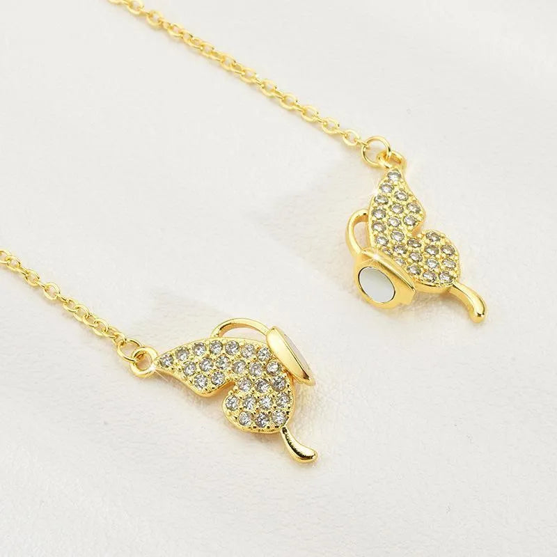Gold titanium steel clavicle chain with magnetic butterfly closure and twisted chain design