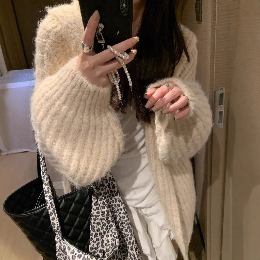 Women's loose fit hooded cardigan in thick acrylic fabric, shown in brown, dark grey, and milky white colour options