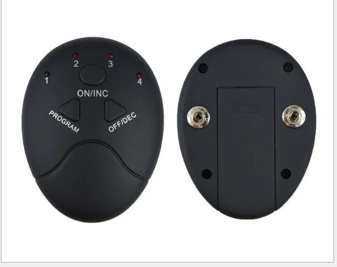 Black EMS muscle stimulator with electrode pads placed on abdomen for slimming and toning