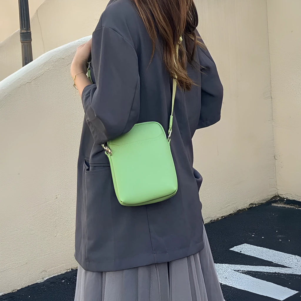Solid colour simple PU crossbody shoulder bag for mobile phones in black, beige, khaki, or green.