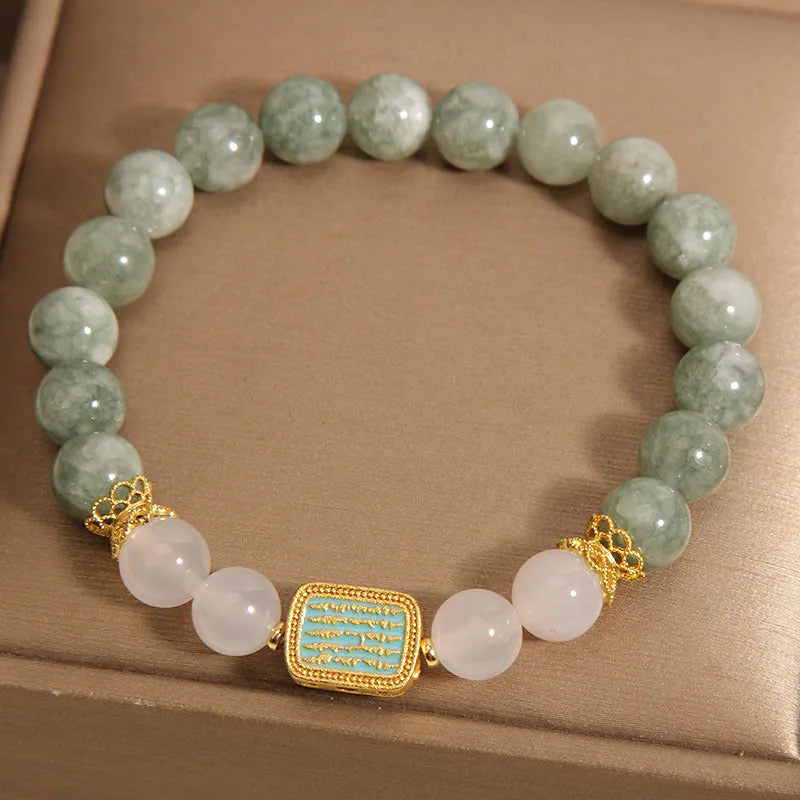 Women's oil green emerald crystal bracelet with five-strand design on female wrist