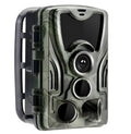 Green cellular trail game camera showing front lens and display, dimensions 135x90x76mm