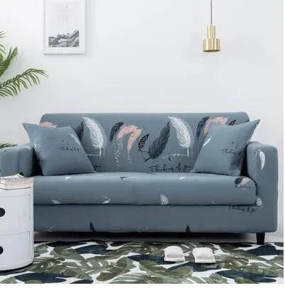 Geometric print polyester sofa slipcover stretched over sofa with matching pillowcase