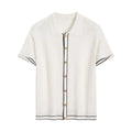 White women's short sleeve cardigan with dark contrast lapels on a front view.