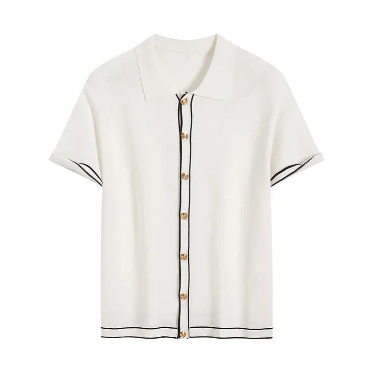 White women's short sleeve cardigan with dark contrast lapels on a front view.