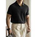 Men's blue American-style short-sleeve polo shirt on a hanger