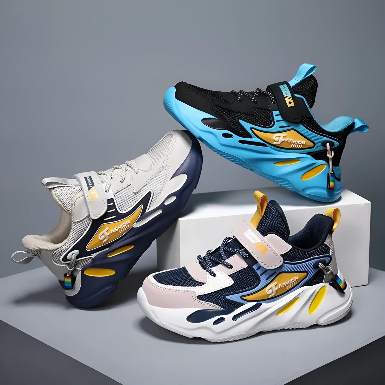 Boys' dark blue and black platform sports running shoes with Velcro strap and mesh upper.