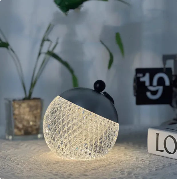Portable dimmable LED night lamp with touch control in minimalist design, 12cm diameter and height