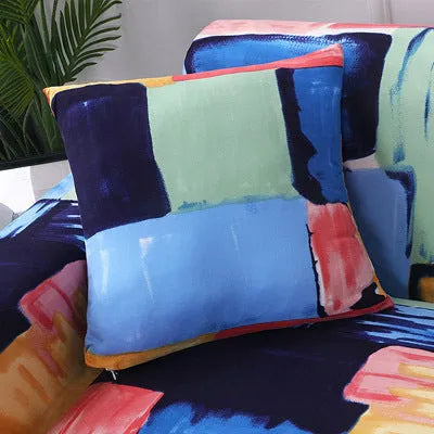 Geometric print polyester sofa slipcover stretched over sofa with matching pillowcase