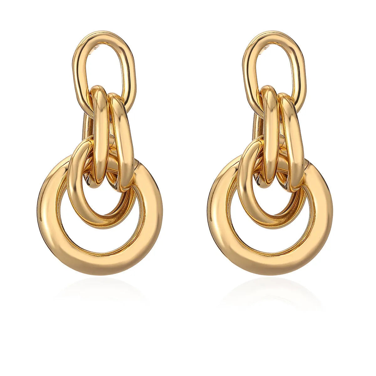 Geometric copper earrings with gold colour finish in irregular shape
