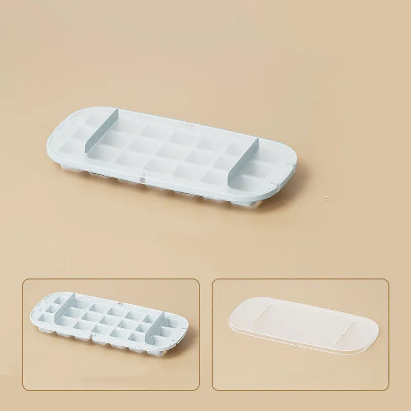 Colourful ice cube tray with grid design and integrated ice shovel storage compartment
