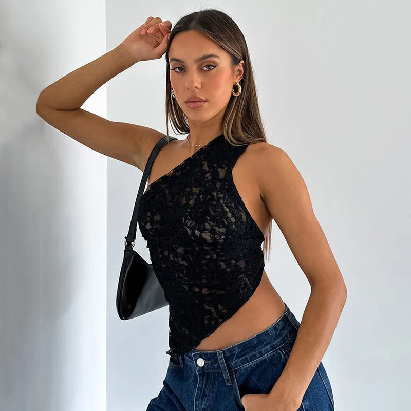 Women's apricot lace backless sleeveless top with an asymmetrical neckline on a hanger.