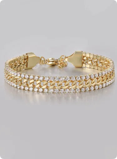 Gold tennis bracelet with stone detailing on titanium steel band