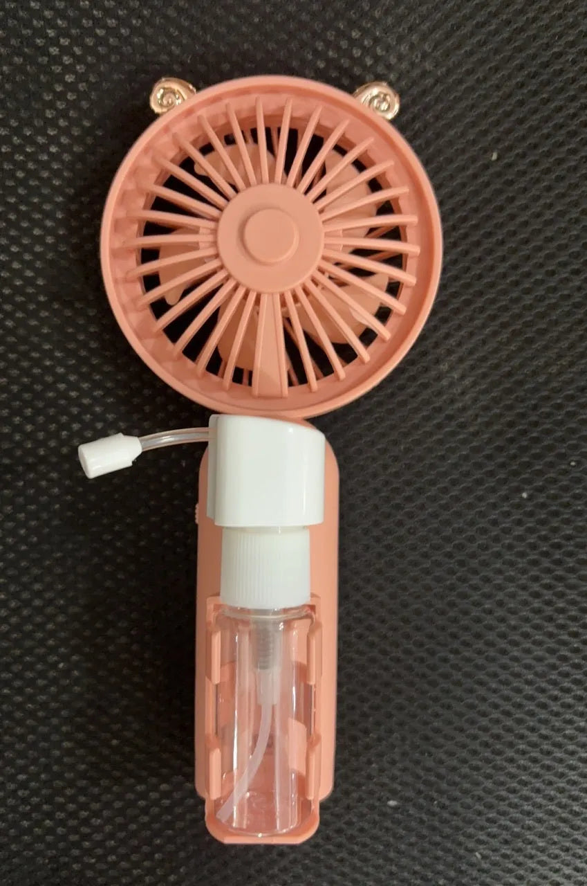 USB rechargeable plastic nozzle desk fan in apricot colour with compact 20cm width design