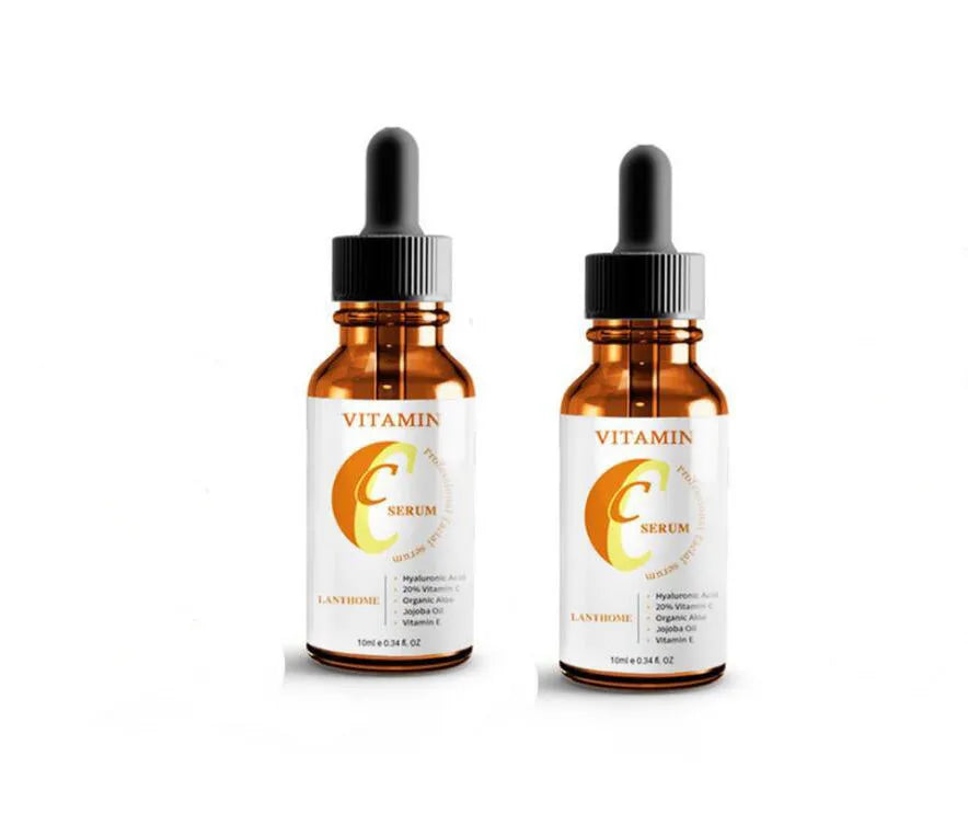 Bottle of Vitamin C and Hyaluronic Acid facial serum for anti-aging and skin brightening.