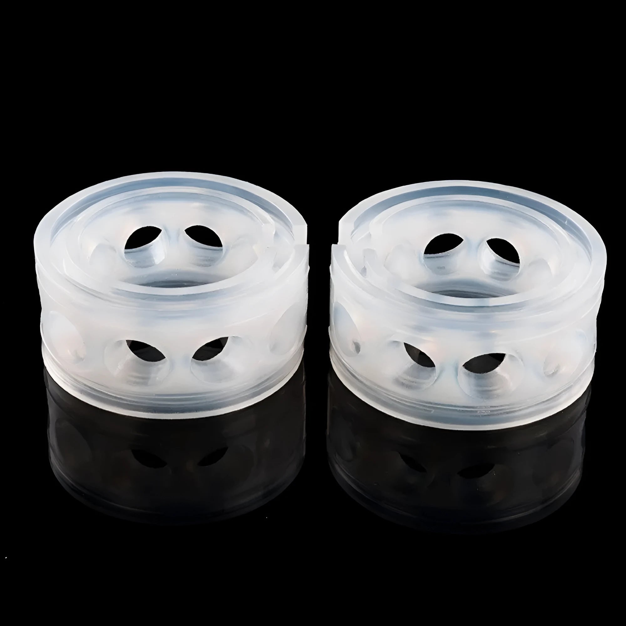 A pair of transparent rubber shock absorbers for car suspension springs, shown with size measurement diagram.