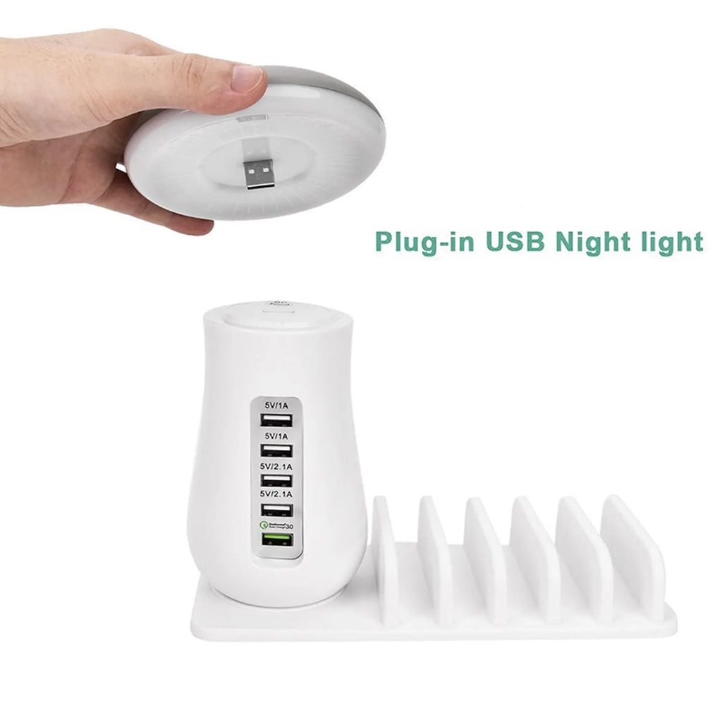 White mushroom-shaped USB charging station with 5 ports and LED lamp for desk organisation
