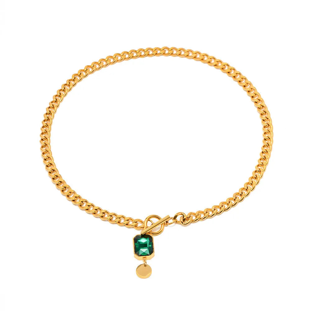 Gold electroplated titanium steel necklace with geometric round pendant on Cuban link chain