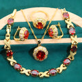 18k gold plated zircon jewellery set showing necklace, earrings, bracelet, and ring with sparkling cubic zirconia stones