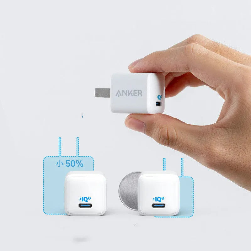 White USB travel charger with 18W power rating for mobile phone charging