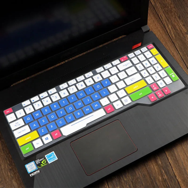 Transparent silicone keyboard protective film for ASUS Flight laptop on a keyboard.