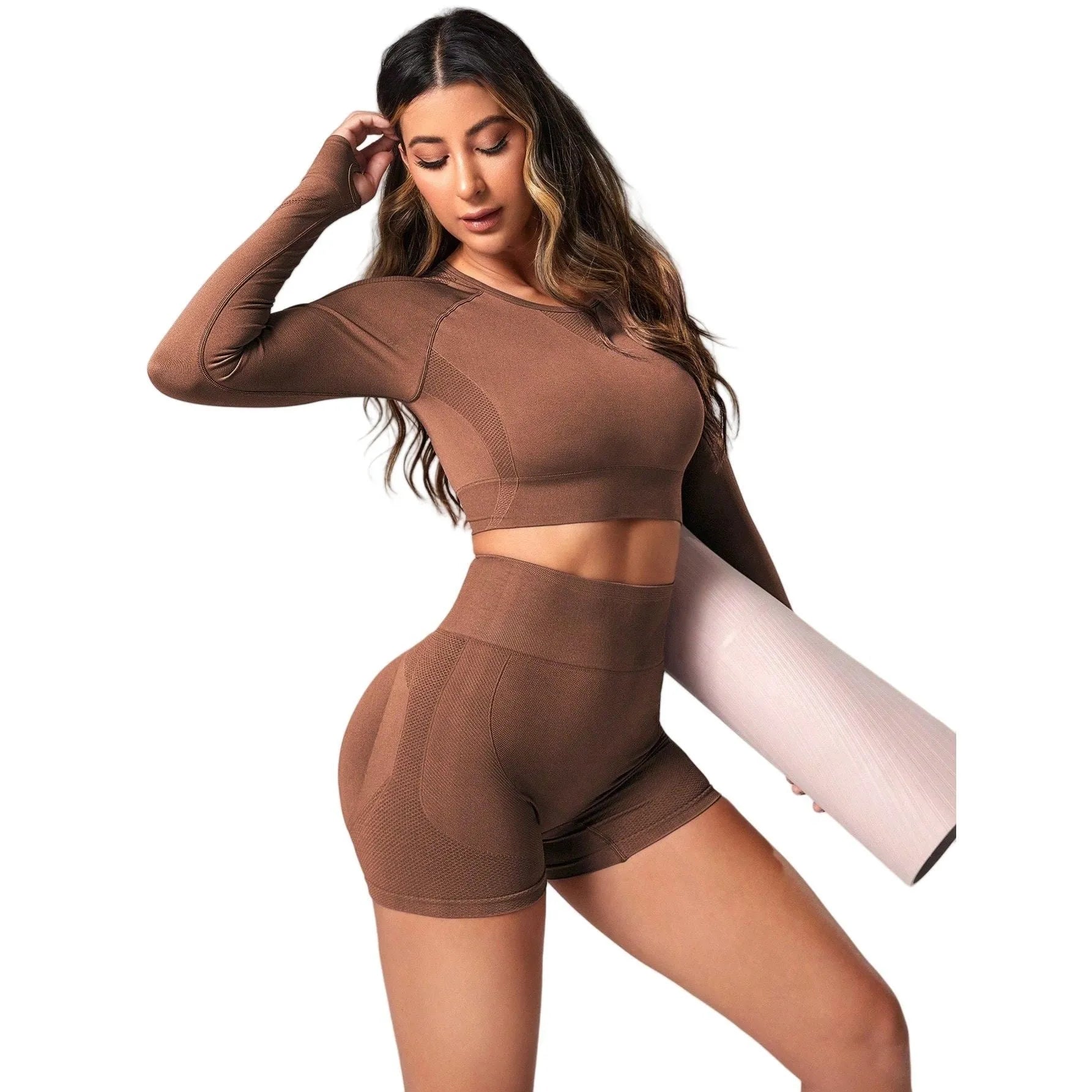 Women's black yoga suit with high waist hip lift design and long sleeves for fitness activities