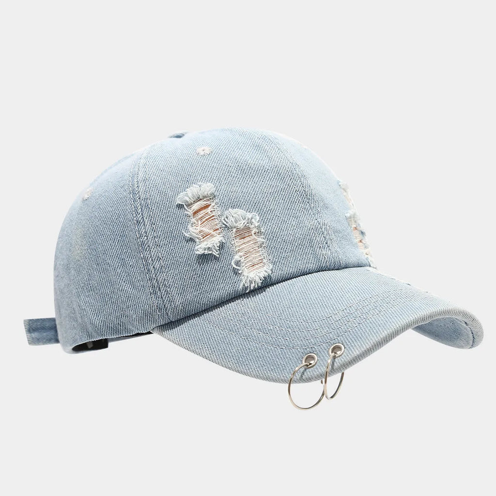 Men's black denim peaked cap with a dome crown on an adjustable strap.
