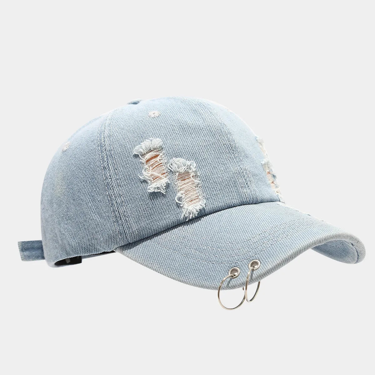 Men's black denim peaked cap with a dome crown on an adjustable strap.