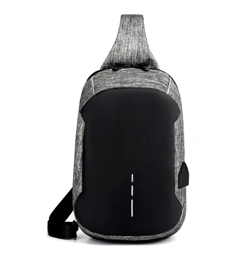 Small dark blue oxford cloth waterproof chest bag with a single strap and zipper.