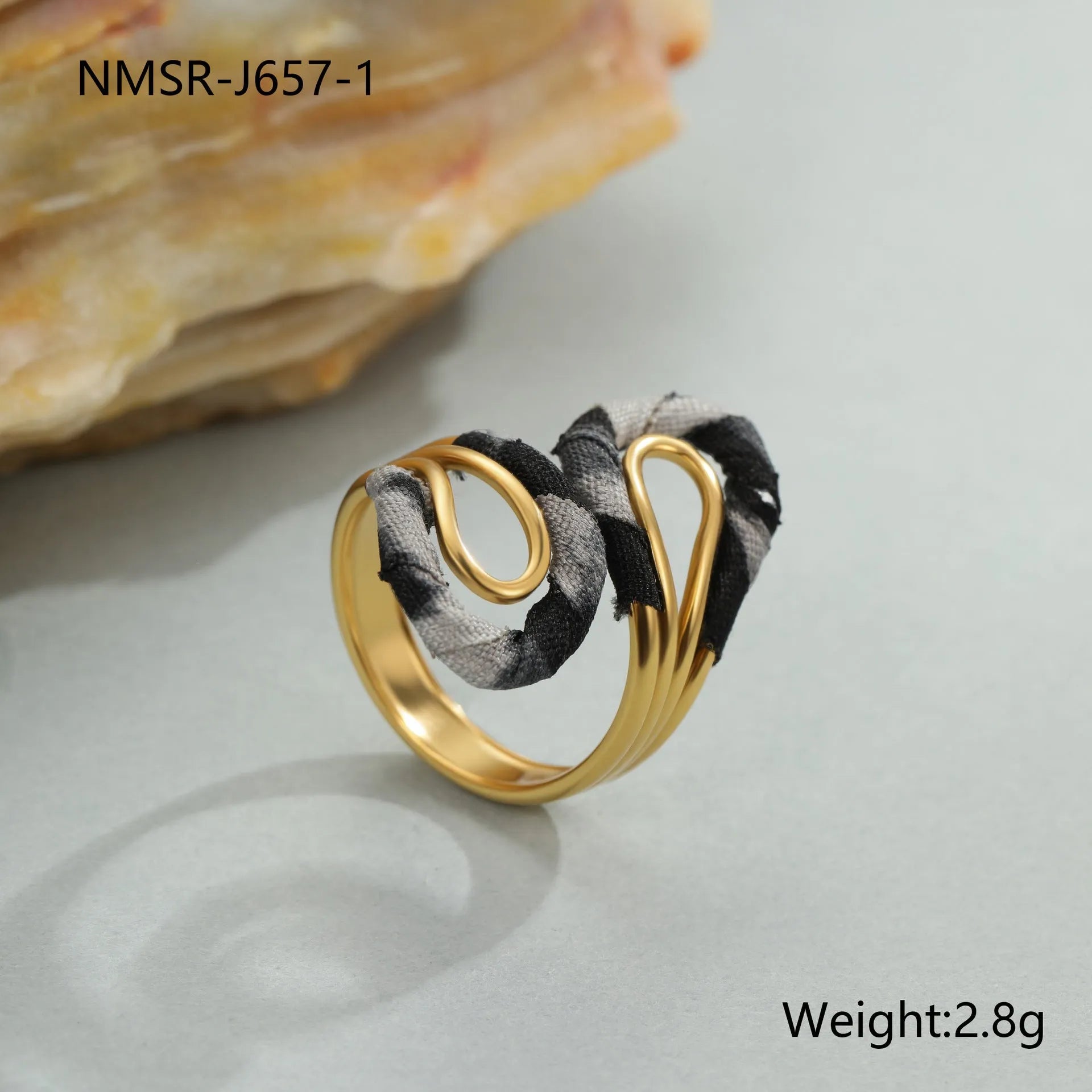 Stainless steel open mouth ring with leopard print and geometric designs including heart and star shapes