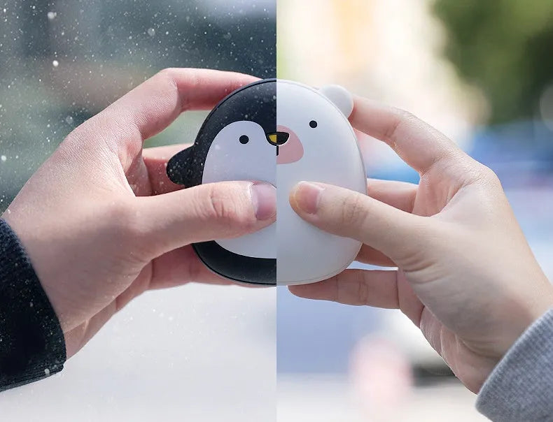 Cartoon penguin polar bear USB rechargeable hand warmer power bank showing black, white, and black-white colour options