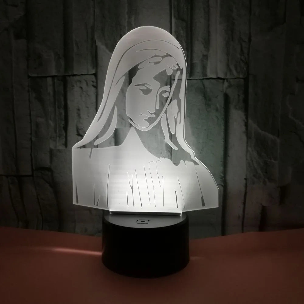 3D LED night light showing illuminated blue dual-ring pattern on acrylic plate with black ABS base.