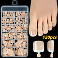 Box of 120 French white edge full square short nude toe nail tips on a white background.