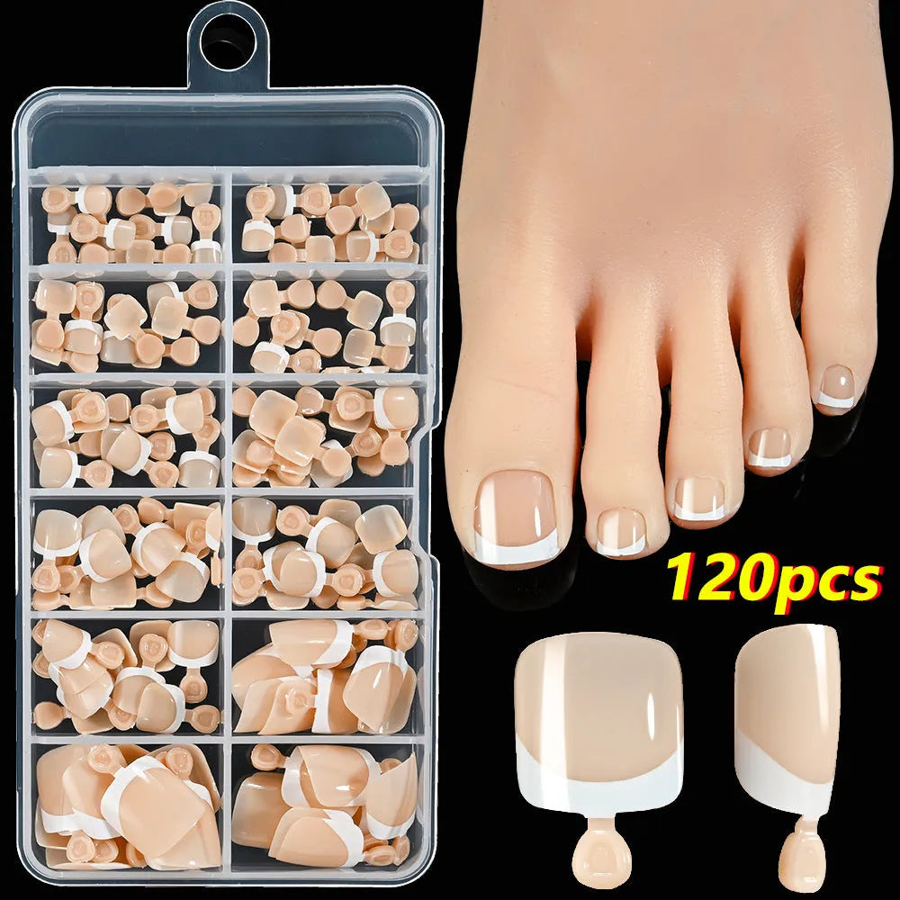 Box of 120 French white edge full square short nude toe nail tips on a white background.