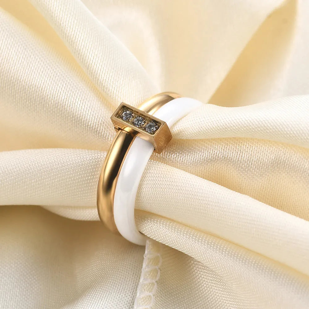 Women's ceramic geometric ring with zirconium inlay and glossy stitching in steel black finish