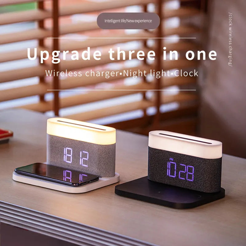 White wireless charging desktop clock with LED display and foldable stand on a wooden desk.