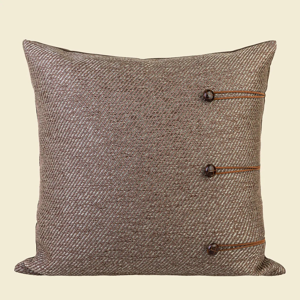 Chinese style square cushion in Maillard colour on a sofa, 45cm size with geometric pattern.