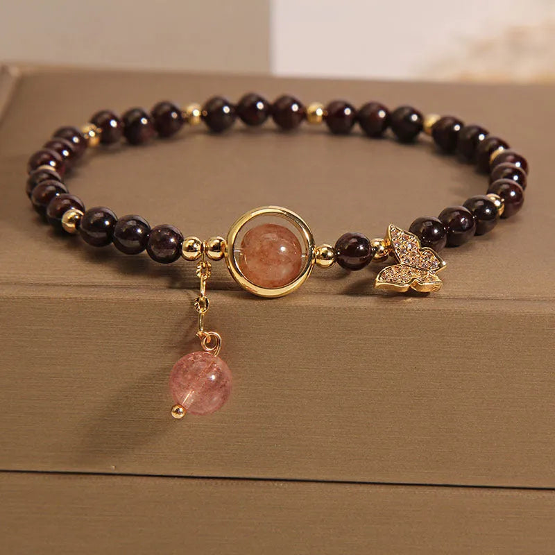 Black stone micro inlay butterfly pendant bracelet on wrist