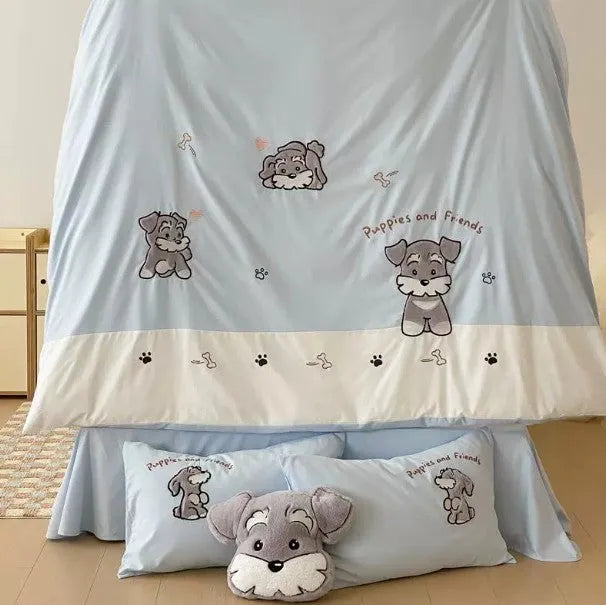 Schnauzer dog cartoon embroidered cotton bedding set with quilt cover, sheet, and pillowcases on a bed.