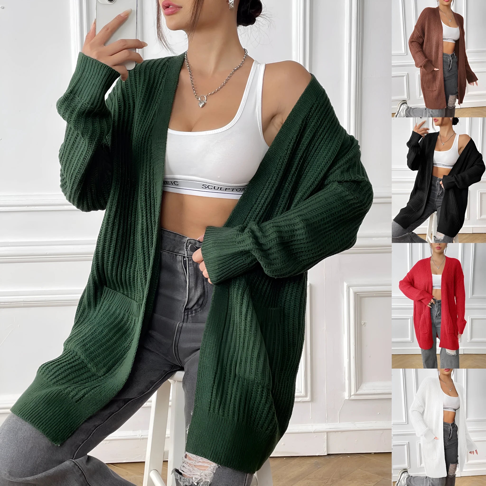 Women's dark green double pocket cardigan with long sleeves and loose fit.