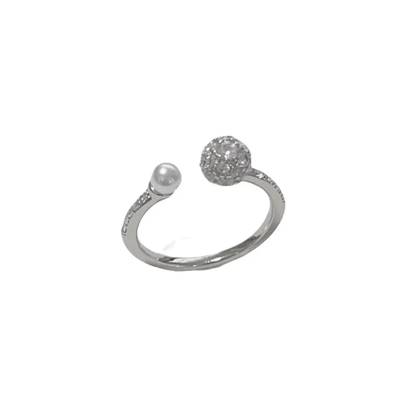 Women's open-end ring with round zircon stones and gold plating on geometric copper band